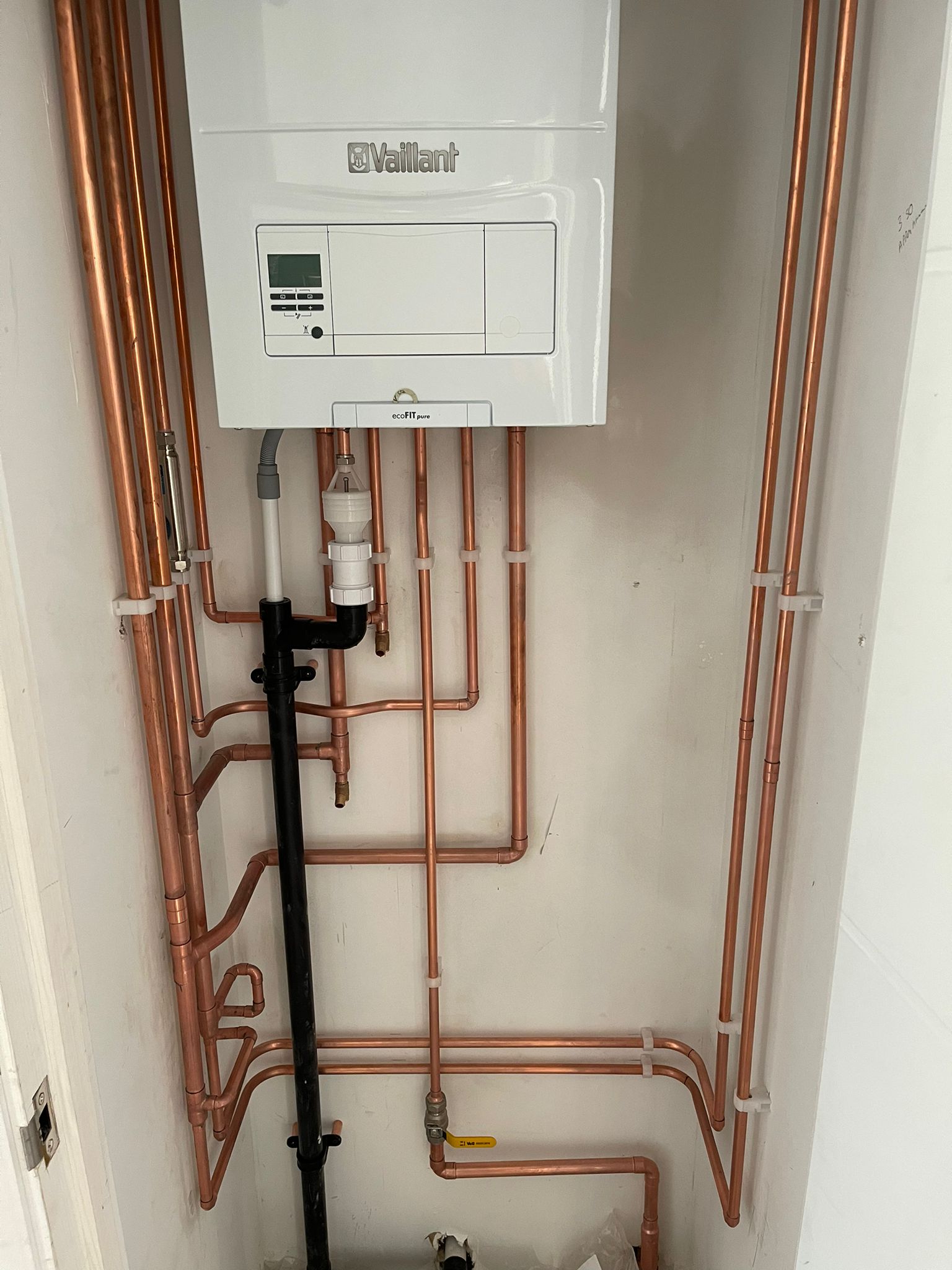 New Vaillant Boiler Installation with exposed copper pipes